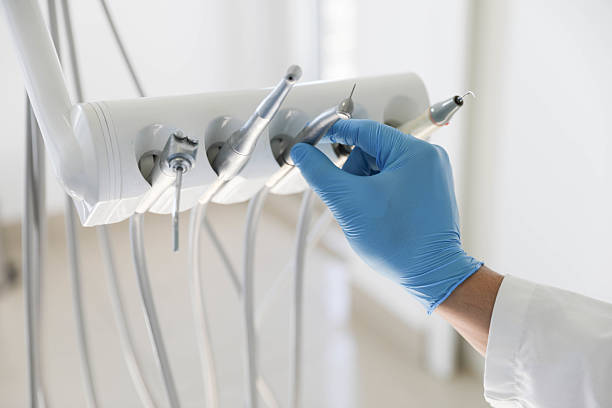 Professional Tooth Extraction technician working in Harbor Springs, MI